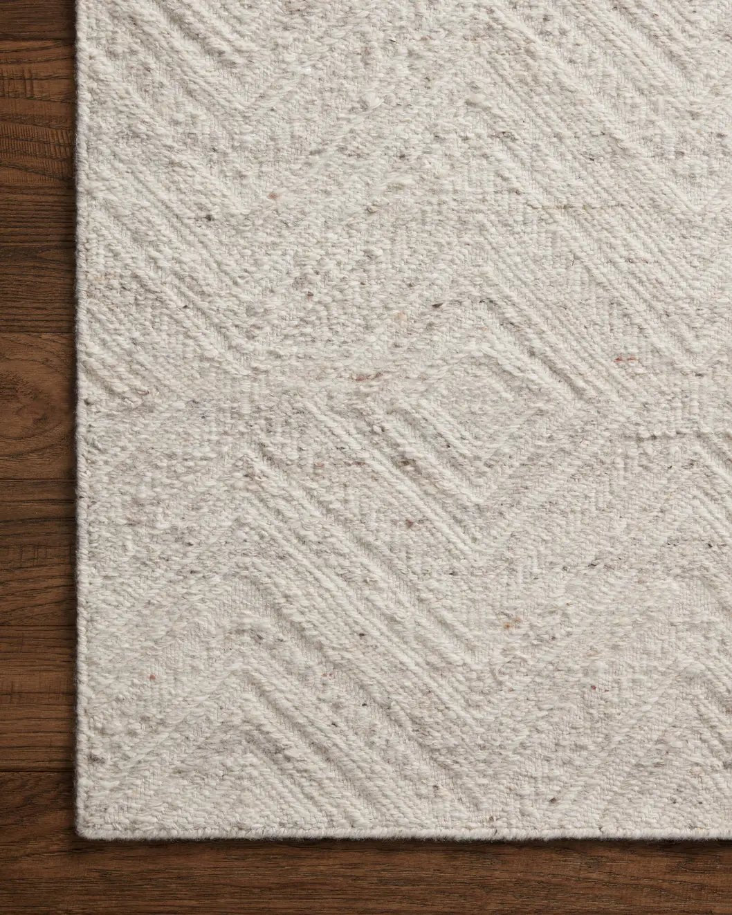 Loloi Raven Rav-04 Ivory/Pebble Rug - corner on wood