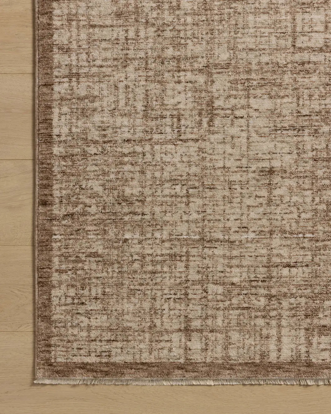 Loloi Winston WIT-01 Earth / Bone Rug - corner on wood