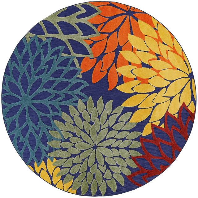 Nourison Aloha circular rug with navy, orange, yellow and green floral pattern
