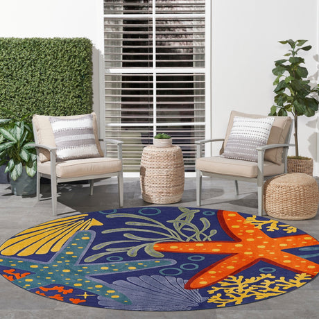 Round navy multicolor rug with tropical sea life graphics