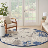 Nourison Aloha blue-gray and ivory round rug with scrolling floral medallions