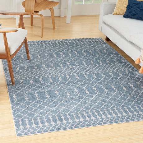 Blue rectangular area rug with trellis lattice geometric pattern