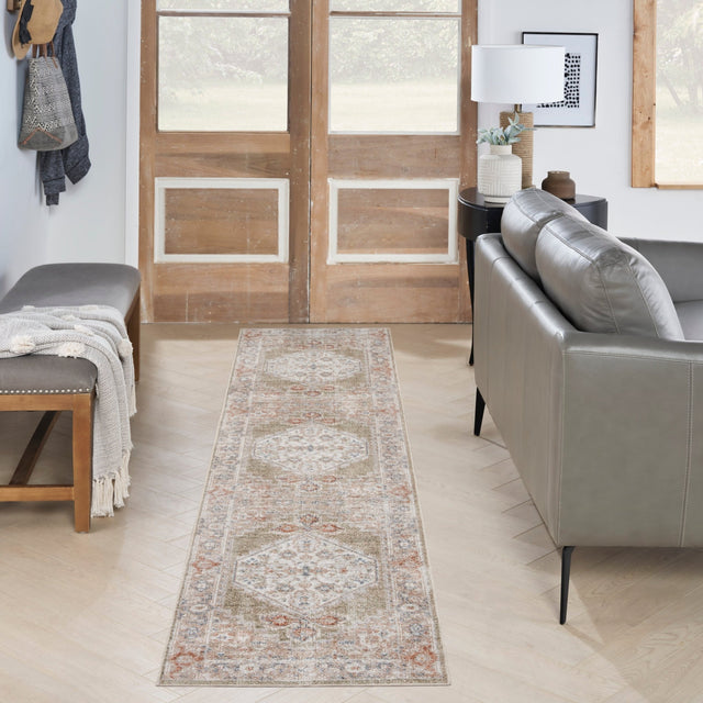 Rectangular sage multi runner rug with ornate diamond motifs and distressed border