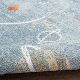 Blue and multicolor abstract machine-washable area rug with textured pile detail
