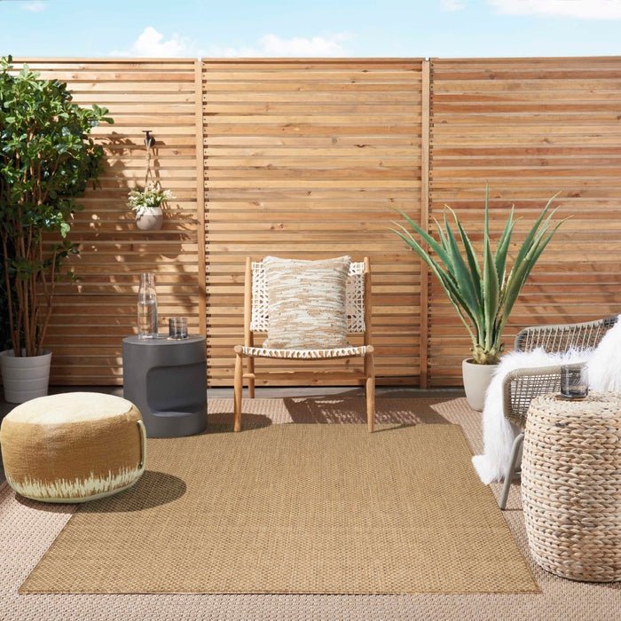 Tan jute rug with diamond weave pattern for outdoor use
