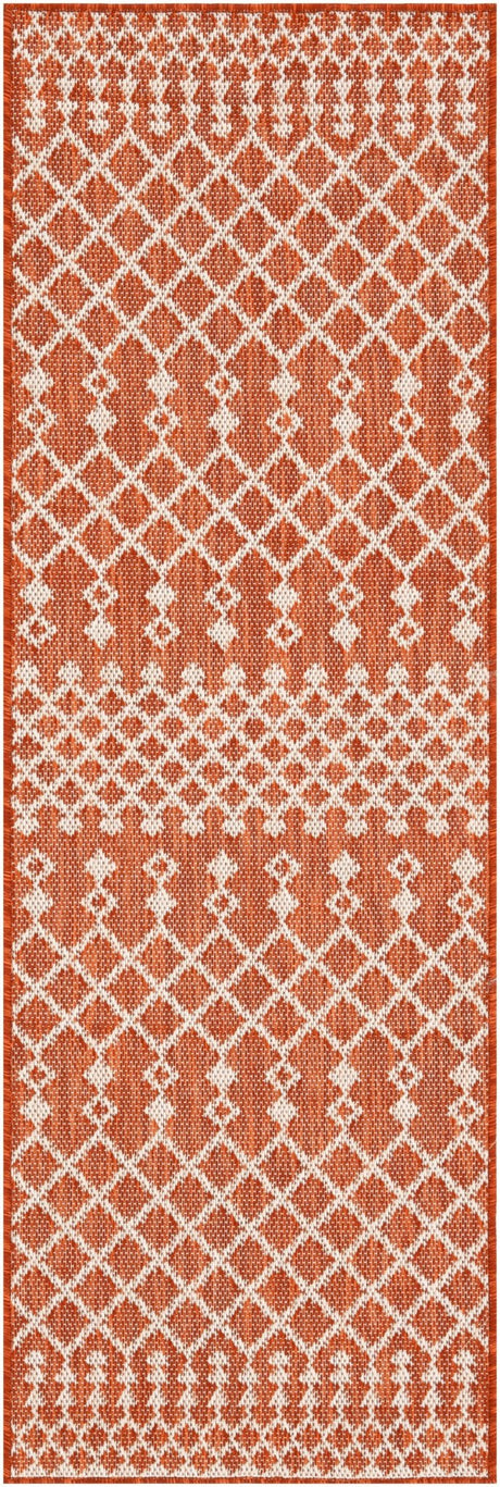 Terracotta rectangular rug with white geometric diamond pattern border