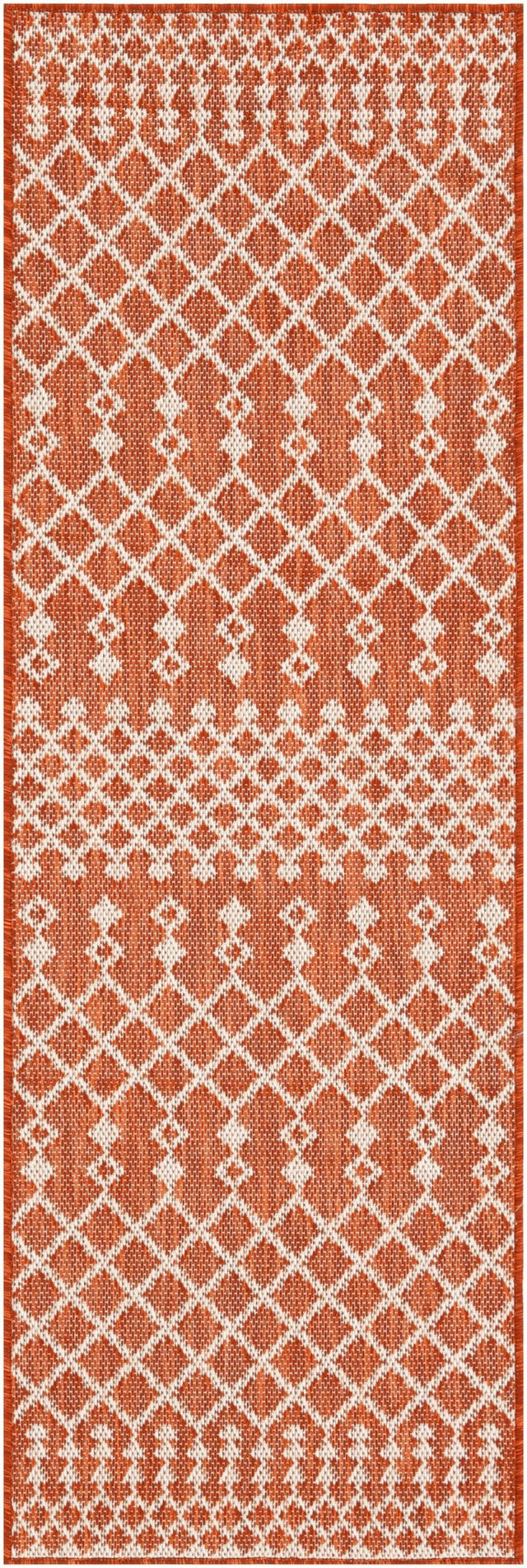 Terracotta rectangular rug with white geometric diamond pattern border