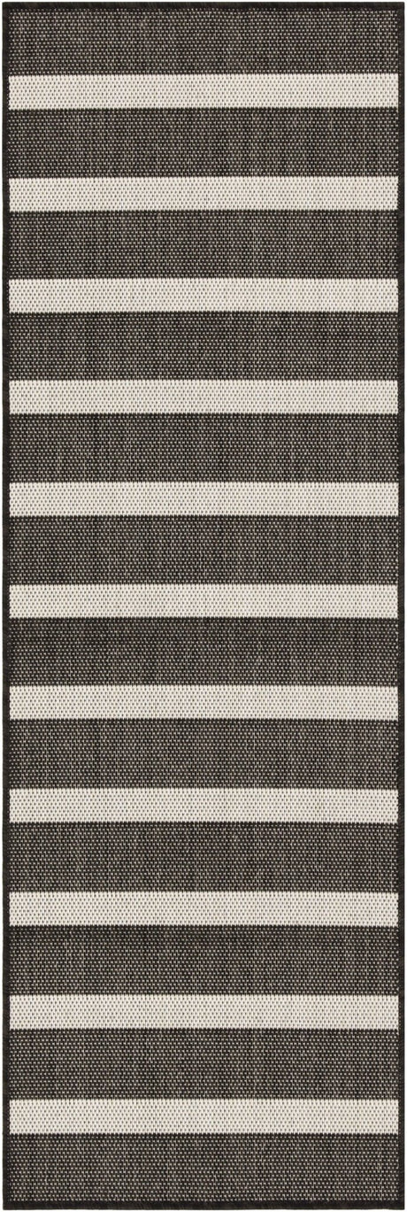 Black and ivory striped rectangular rug with flat woven pattern