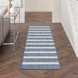 Rectangular navy and ivory striped runner rug with bordered edges