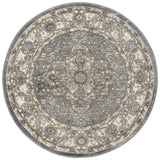 Blue and gray vintage-style round area rug with ornate central pattern
