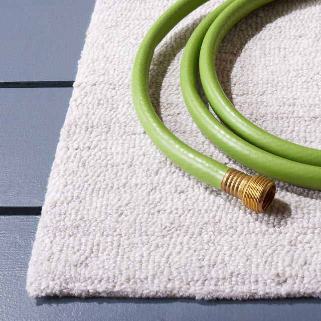 Safavieh Outdoor Micro-Loop Omp101B Beige Rug.