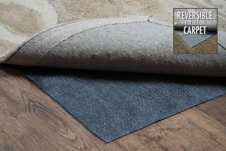 Gray rug pad with felt-like texture, shown layered for under carpet protection