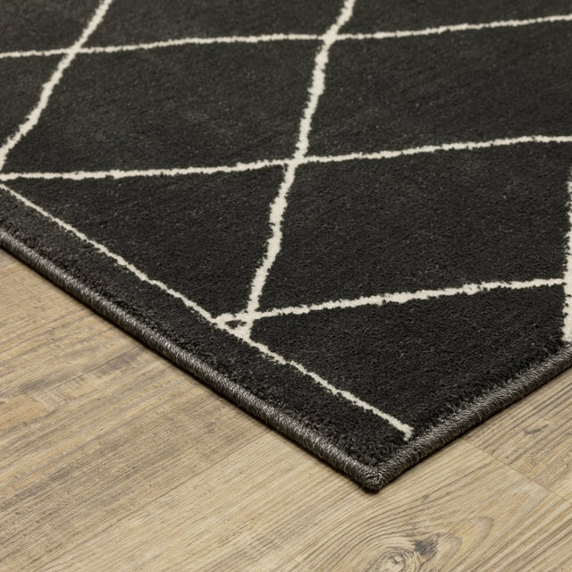 Oriental Weavers Sphinx Raylan Ray12 Black/ Ivory Rug.