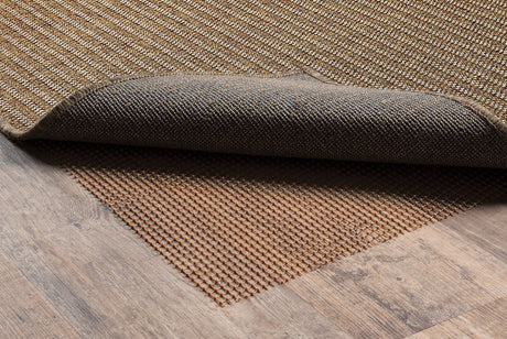 Outdoor rug pad with textured grid surface, rolled edge shown on floor