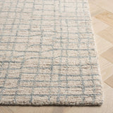 Safavieh Abstract 4'-0" x 6'-0" Rug in Ivory / Light Blue