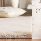 Safavieh Abstract 4'-0" x 6'-0" Rug in Beige / Ivory