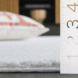Safavieh Boucle 100 5'-0" x 7'-0" Rug in Ivory