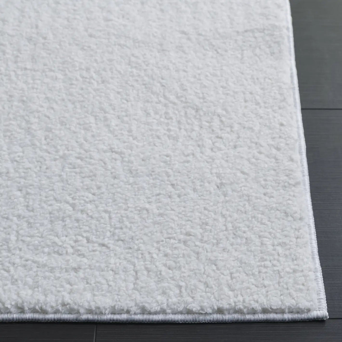 Safavieh Boucle 100 5'-0" x 7'-0" Rug in Ivory