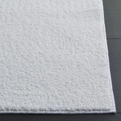 Safavieh Boucle 100 5'-0" x 7'-0" Rug in Ivory