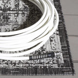 Safavieh Courtyard 5'-3" x 7'-7" Rug in Grey / Black