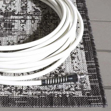 Safavieh Courtyard 5'-3" x 7'-7" Rug in Grey / Black