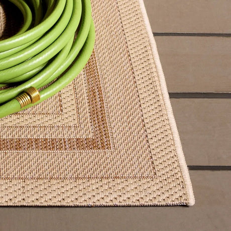 Safavieh Courtyard 5'-3" x 7'-7" Rug in Dark Beig / Beige