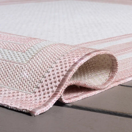 Safavieh Courtyard 5'-3" x 7'-7" Rug in Ivory / Pink