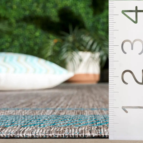 Safavieh Courtyard 5'-3" x 7'-7" Rug in Green / Aqua