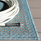 Safavieh Courtyard 5'-3" x 7'-7" Rug in Aqua / Grey