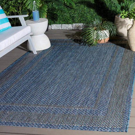 Safavieh Courtyard 5'-3" x 7'-7" Rug in Navy / Grey