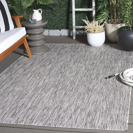 Safavieh Courtyard 4'-0" x 5'-7" Rug in Ivory / Dark Grey