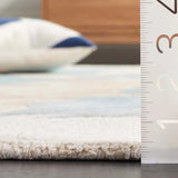 Safavieh Fifth Avenue 4'-0" x 6'-0" Rug in Beige / Teal