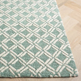 Safavieh Genre 4'-0" x 6'-0" Rug in Green / Ivory