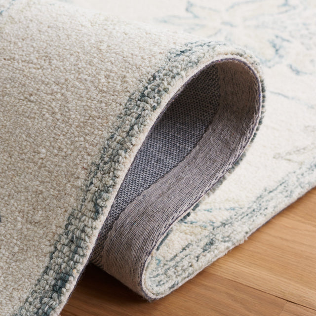 Safavieh Micro-Loop Mlp477A Ivory/Blue Rug.