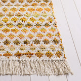Safavieh Montauk 4'-0" x 6'-0" Rug in Yellow / Ivory