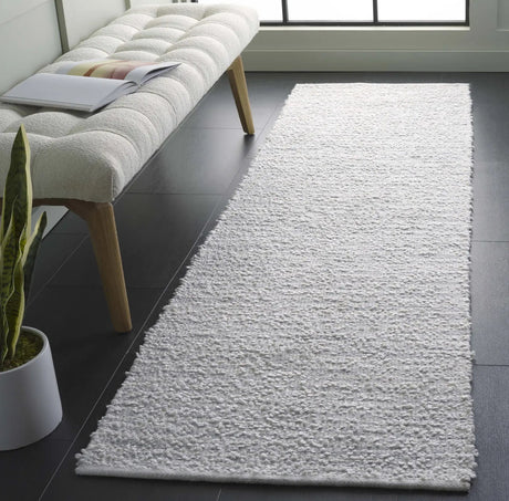 Safavieh Renewal 2'-3" x 8'-0" Rug in Light Blue / Ivory
