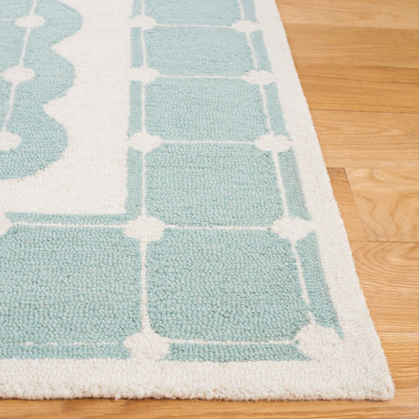 Safavieh Safavieh Kids Sfk927K Turquoise/Ivory Rug.