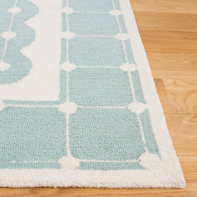 Safavieh Safavieh Kids Sfk927K Turquoise/Ivory Rug.
