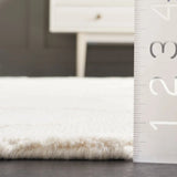 Safavieh Soho 4'-0" x 6'-0" Rug in Beige / Ivory
