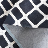 Safavieh Studio Leather 4'-0" x 6'-0" Rug in Black / Ivory