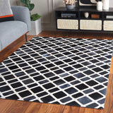 Safavieh Studio Leather 4'-0" x 6'-0" Rug in Black / Ivory