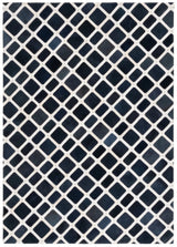 Safavieh Studio Leather 4'-0" x 6'-0" Rug in Black / Ivory