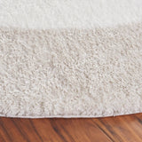 Safavieh Tahoe Shag 6'-7" x 6'-7" Rug in Beige / Ivory