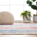 Safavieh Washable Printed Rug 4'-0" x 6'-0" Rug in Turquoise / Red