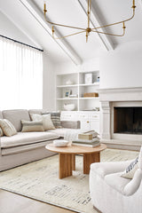 Handmade rectangular area rug with light neutral geometric pattern