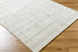 Surya Moab handmade rug, light gray speckled texture with subtle border, rectangle