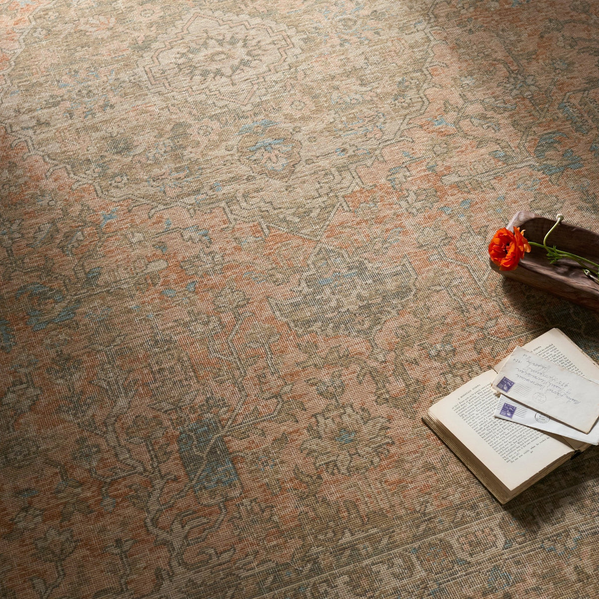 Handmade rug with faded geometric motif, beige base with olive and rust tones