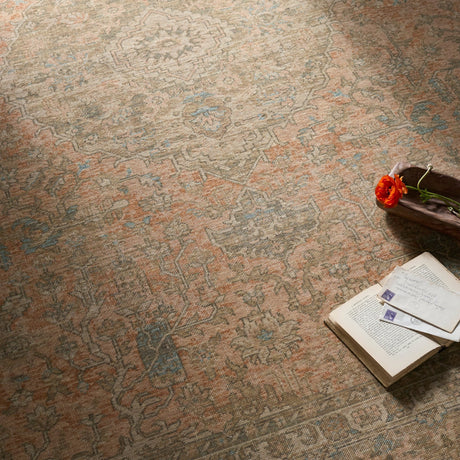 Handmade rug with faded geometric motif, beige base with olive and rust tones