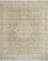 Handmade area rug in light beige with subtle blue ornamental medallion and textured pattern
