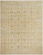 Handmade area rug with ornate geometric motif in beige and sage tones, bordered design
